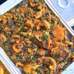 Efo riro with mackerel, pomo, shaki & roundabout