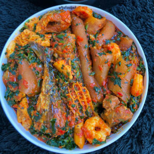 Efo riro with hake fish, Pomo & shaki