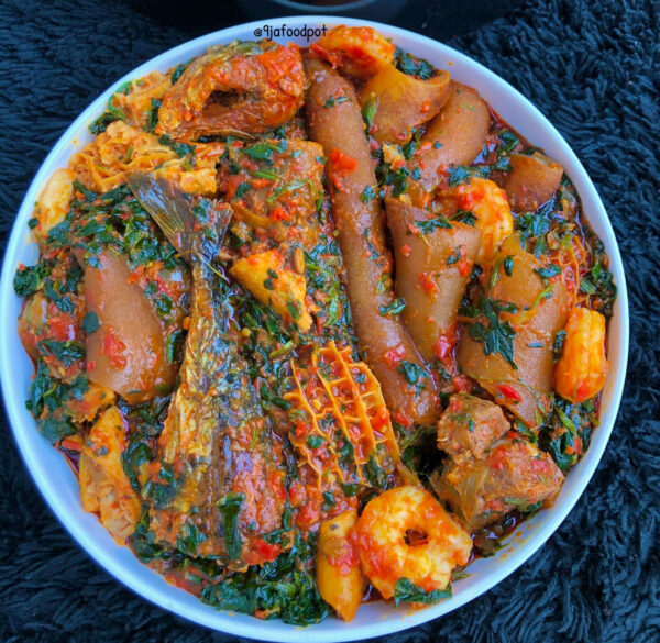 Efo riro with hake fish, Pomo & shaki